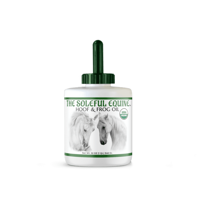 A bottle of horse oil on a black background